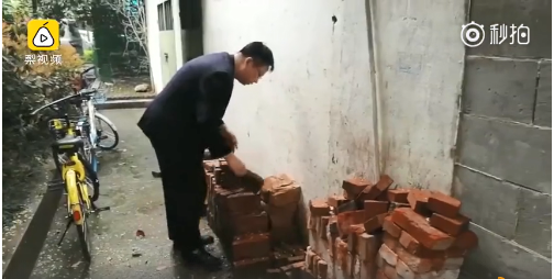 A hotel added a rooftop bar with views of the city skyline