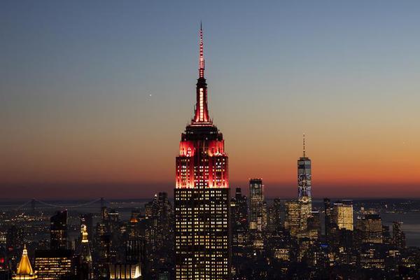 A global climate change summit concluded with 115 countries committing to cut greenhouse gas emissions by 52% by 2030