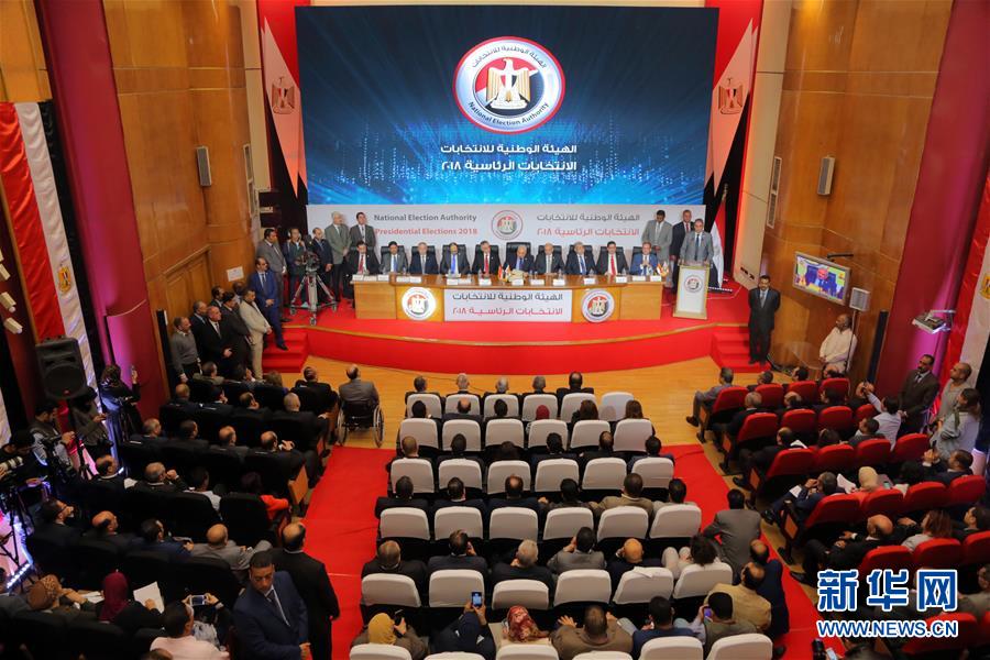 Local firefighters rescued three people from a burning building early this morning with no serious injuries